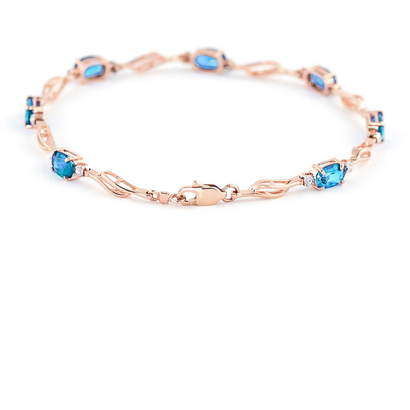 14K. GOLD TENNIS BRACELET WITH BLUE TOPAZ & DIAMONDS (Rose Gold) - Picture 3 of 4